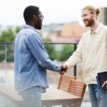 business handshake before meeting vk8ql8d
