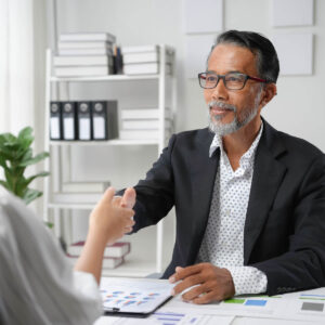senior manager shaking hands with a young female p 2024 12 27 17 20 49 utc (1) (1)